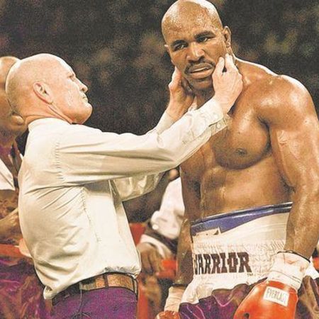 Mills checking Mike Tyson 